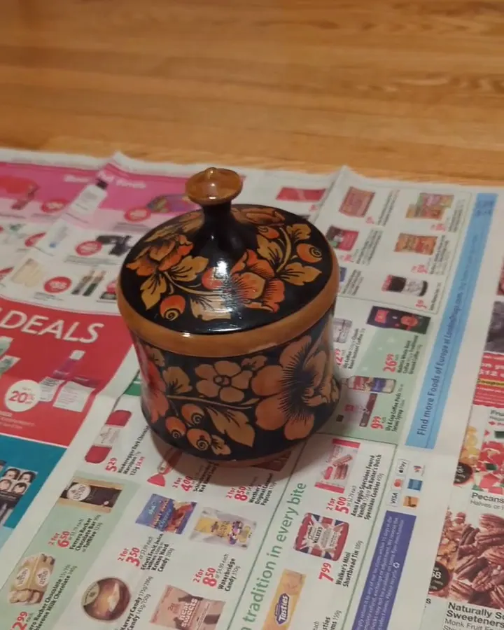 A frame from the phone video of the lacquer box.